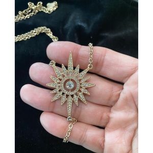 Beautiful long gold necklace with star accent